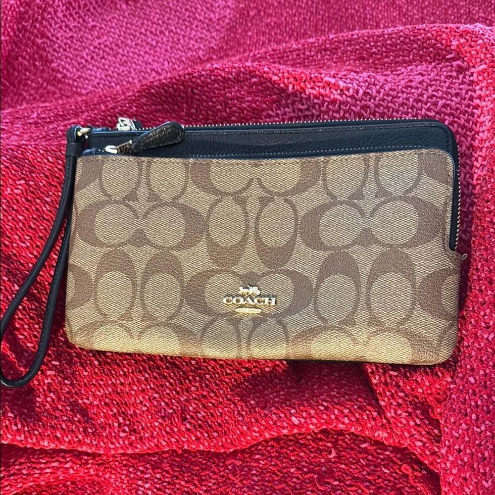 Like New Coach Signature Large Tan and Black Wristlet